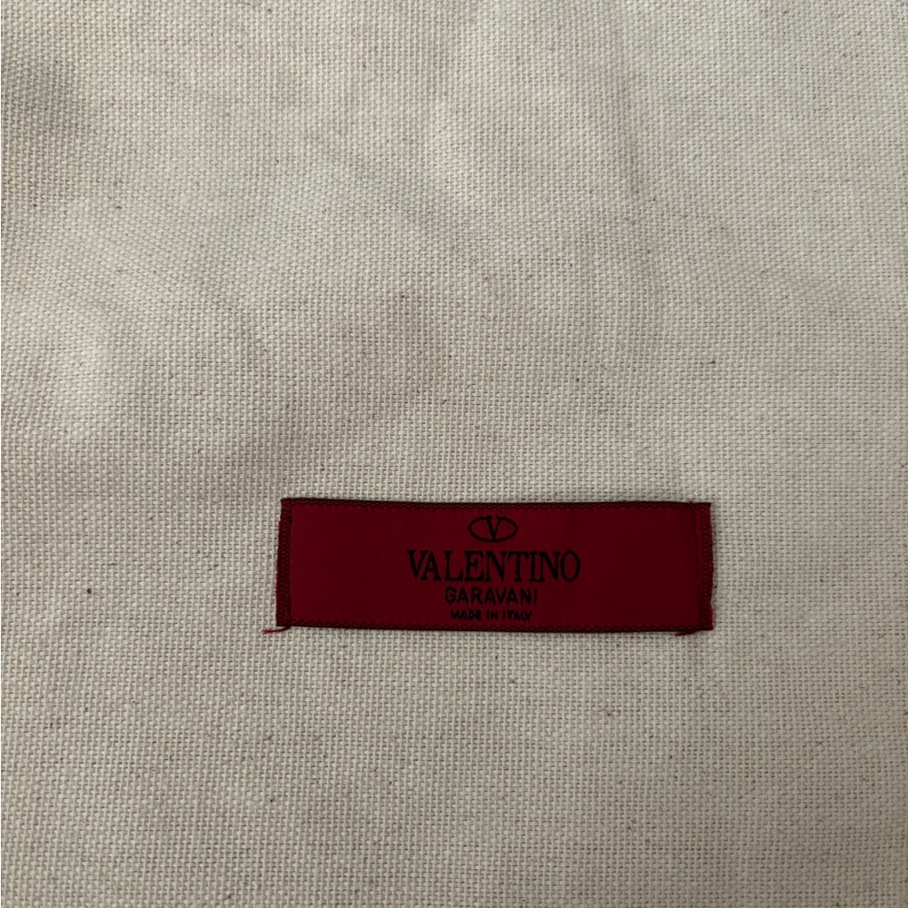 Valentino Garavani Red Label on Cream Fabric